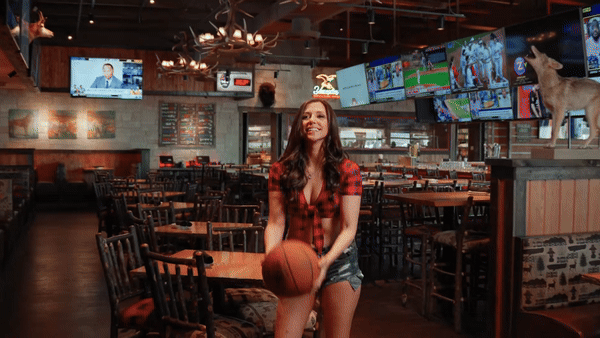 Twin Peaks Girl catching a basketball in the restaurant